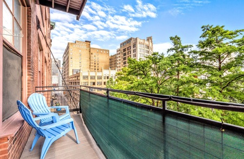 Downtown West Apartment | DWTN Loft✦160" Theater Screen✦Walk to Attractions✦Private Balcony