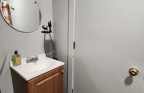 Bear Creek Cottage | Dy cabin with shared bath house.