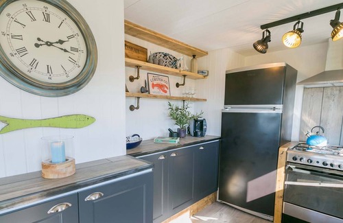 Llanerchymedd Cottage | Easter Cabin - a remote that sleeps 4 guests in 2 bedrooms