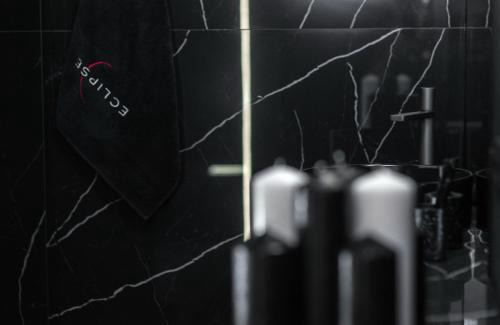 Bielsko-Biala Apartment | Eclipse Black Room