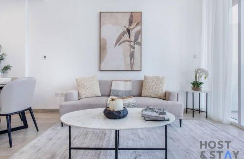 Jumeirah Village Circle House | Elegant 1BR at Bloom - Host & Stay