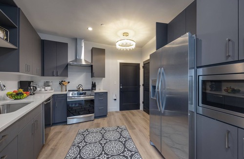 West End Condo | Elegant Corner Penthouse with Private Balcony, Skyline Views, Pool, and Gym