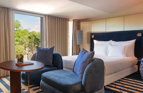 Belem Hotel | Elegant Lisbon Stay with Indoor & Outdoor Pools | Pet-Friendly with Free Parking