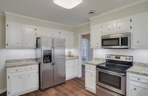 Summerville Condo | Elegant Masters Retreat – Magnolia Villa Condo Near Augusta National