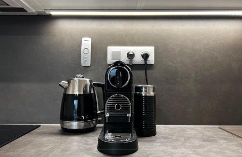 Smichov Apartment | Elegant Prague Flat with Balcony, Workspace, Garage