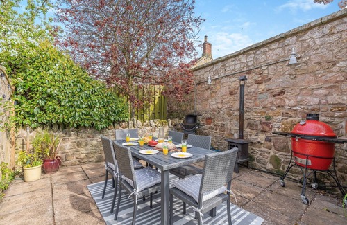 Beadnell Cottage | Embrace Coastal Comforts by the Fire: Your Perfect Retreat Awaits in Beadnell.