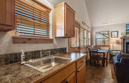 Dover House | Embrace lakeside serenity at this cozy Dover Bay bungalow, just steps from the water, perfect for couples or families seeking peaceful Idaho charm.