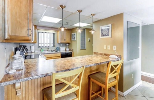 Crescent Beach Condo | Emerald Water & Sugar White Sand Awaits You! Beachfront Condo, Pool & Tiki Bar