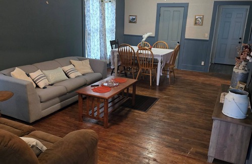 Herington House | Enchanted Cottage, located in Herington, KS with 1.5 bedrooms and a shaded yard