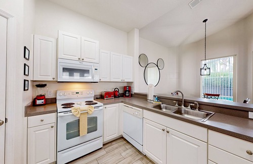 Tuscan Hills House | Enchanting retreat with pool, game room, & lanai - close to parks