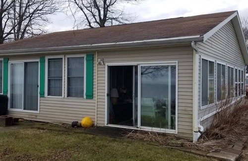 Geneva Cottage | Enjoy Lakefront Sunsets! Roomy 2 bed known as Water to Wine Lakefront Cottage