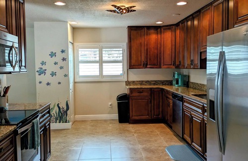 Venetian Way House | Entire home in Cocoa Beach, Florida. 6 guests, 4 bedrooms, 5 beds, 2 baths