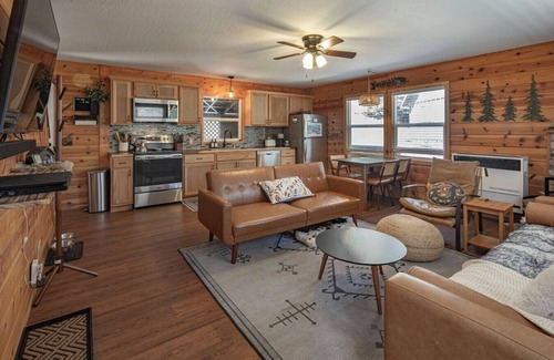 Long Barn Cabin | Escape to a cozy cabin in the pines where you can unwind, relax, and reconnect with nature.