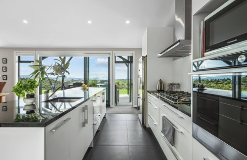 Mangawhai House | Exclusive home with uninterrupted views of the Hen & Chicks, set in Native Bush