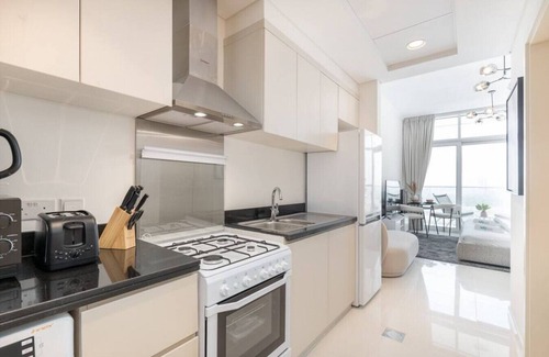 Dubai Apartment | Executive Studio in Damac Hills by Suiteable