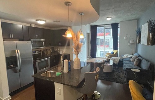 Midtown Apartment | Experience luxury at Royal Escape Midtown, perfectly located for relaxation and adventure. Minutes from top attractions, dining, and corporations, this stylish retreat offers access to a resort-style rooftop pool.