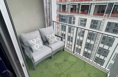 Midtown Apartment | Experience luxury at Royal Escape Midtown, perfectly located for relaxation and adventure. Minutes from top attractions, dining, and corporations, this stylish retreat offers access to a resort-style rooftop pool.