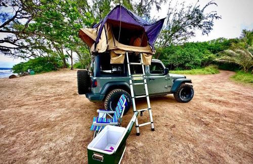 Paia Other | Explore Maui's diverse campgrounds and uncover the island's beauty from fresh perspectives every day as you journey with Aloha Glamp's great jeep equipped with a rooftop tent