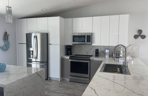 Key Colony Beach Villa | Fabulous Canal Front Villa, 37 ft Dock and 8-person hot tub