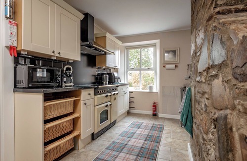 Glenlivet Cottage | Falls Cottage in Speyside on the edge of the stunning Cairngorms National Park.