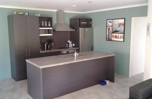 Bowentown House | Family Bach with space to play and close to surf