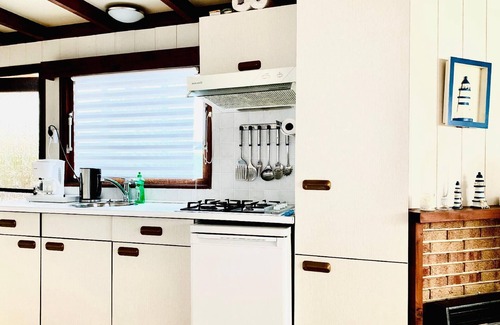 Onderdijk Apartment | Family-friendly holiday home "Angel" with garden and terrace on the Ijsselmeer Grote Vliet Netherlands