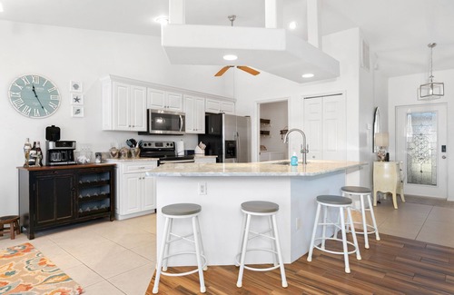 Trafalgar House | Family-friendly home. Heated pool w/lanai. Close to Pine Island, beaches & golf