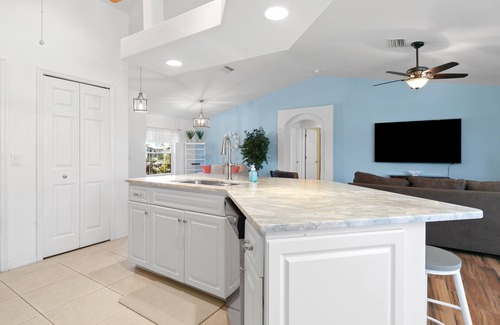 Trafalgar House | Family-friendly home. Heated pool w/lanai. Close to Pine Island, beaches & golf