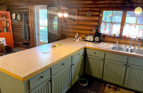 Rapid City Cottage | Family FUN: Torch Lake Cottage with Private Beach Access - Kayaks & SUP Provided