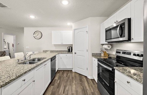 Palm Coast Apartment | Family Pool Retreat Sleeps 10 Near Beach BBQ