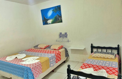 Aldeota House | Family room with private bathroom, Wi-Fi, air conditioning and TV.
