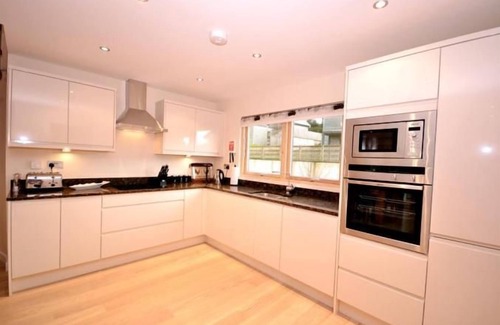 Talland House | Fantastic pet friendly property with large roof area, Charcoal BBQ, ideal for sunbathing and alfresc