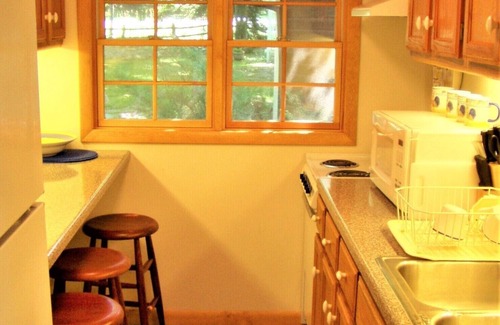 Clam River Cottage | Fantastic Torch Lake Waterfront Cottage B ~ Tennis Court ~ Kayaks And SUP's!