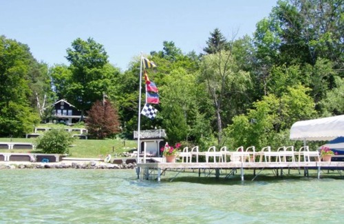 Clam River Cottage | Fantastic Torch Lake Waterfront Cottage B ~ Tennis Court ~ Kayaks And SUP's!