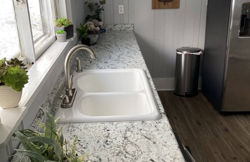 Johnson City House | Farmhouse with game room, creek and fire pit