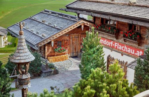 Hundsdorfl House | Ferienhaus im Almdorf in Flachau