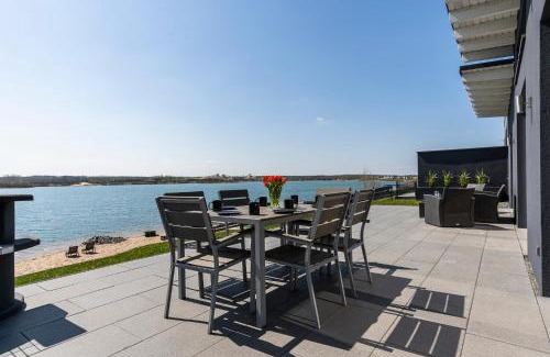 Lobnitz House | Ferienhaus SUNRISE am Mühlfeldsee