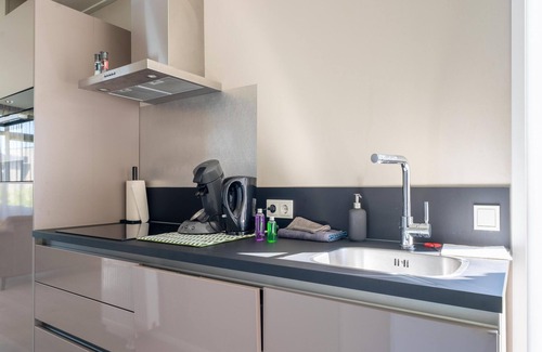 Molenschot House | Fine chalet with a garden in a small park