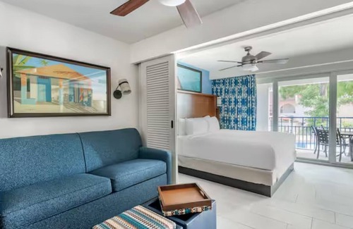Pelican Key Resort | Flamingo Beach by Hilton: Oceanfront Resort, Pools & Spacious Studios To Relax!