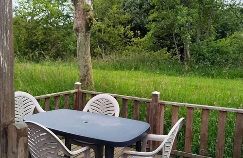 Martigny House | Flower Camping Des 2 Rivières * - Mobile Home Comfort TV - 1 bedroom + semi-covered terrace - 2 to 4 people - 2 people. included in the price