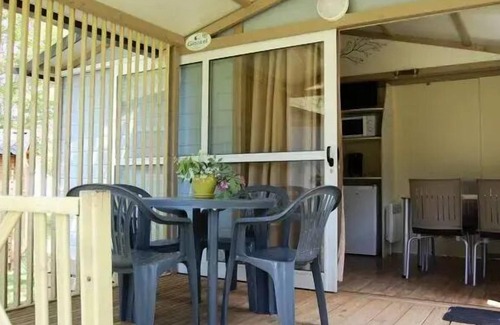 Anduze Ski Chalet | Flower CAMPING FAUVETS * - Chalet NEMO Standard 22m2 (2 bedrooms) + covered terrace 7m2 + CLIM 4 persons