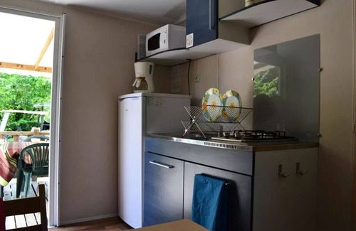 Anduze House | Flower CAMPING FAUVETS * - Mobile home DOMINO Comfort 28m2 (2 bedrooms) + covered terrace 7m2 + air conditioning + tv 5 persons