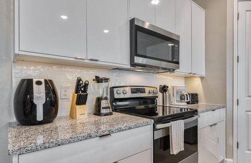 West Kissimmee House | Formosa Valley Resort by UNE Homes