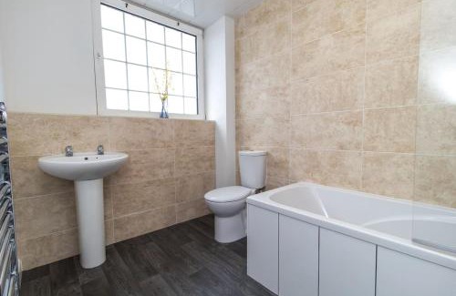 Jarrow House | Free Driveway Parking 3 Double Bedroom House, Ideal for long term contractor, etc stays, 4 miles 11 mins drive to Nissan, 20 mins drive to Sunderland Newcastle, Fast WIFI - see Dwellcome Home Ltd site for assurance