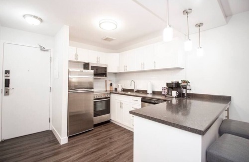 Downtown Winnipeg Apartment | Free Parking, Private Patio, Wi-Fi & Laundry!