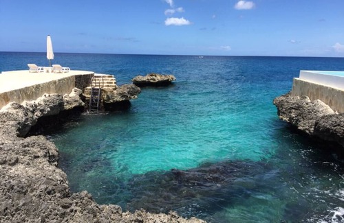 Dominicus Apartment | FRONT CARIBBEAN OCEAN , APARTMENT WITH GARDEN & POOLS & OCEAN ENTRYS