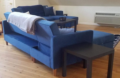 Sandpoint House | Full Suite w/ kitchen, private bedroom, sofa couches and large living area.