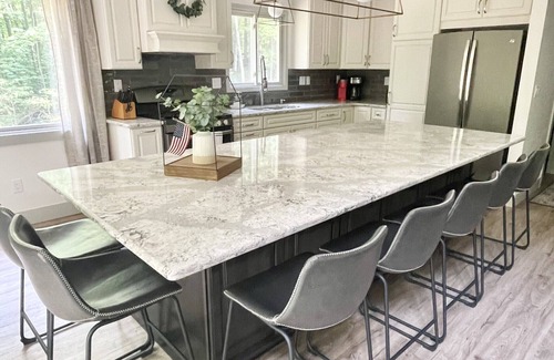 Bellaire Cottage | Fully remodeled cottage on private wooded setting, minutes from golf and skiing!