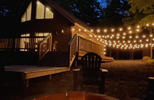 Bellaire Cottage | Fully remodeled cottage on private wooded setting, minutes from golf and skiing!