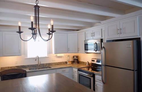 Rehoboth by the Sea Cottage | Fully Renovated Ocean Block Cottage Steps to the Beach w/Off-street Parking